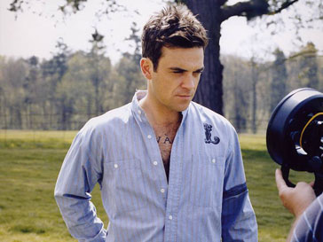 Робби Уильямс (Robbie Williams) поедет вместе с Take That на гастроли Робби Уильямс (Robbie Williams) поедет вместе с Take That на гастроли