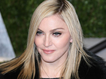 Мадонна (Madonna) стала жертвой огробления Мадонна (Madonna) стала жертвой огробления