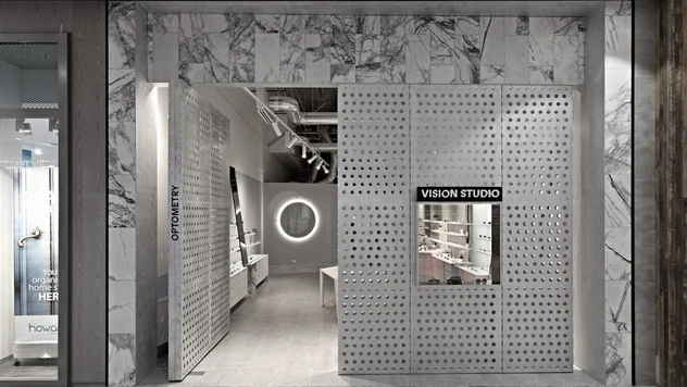 Оптика в Мельбурне с фасадом из перфорированного алюминия