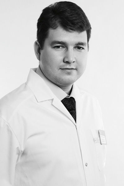 Игорь Валерьевич Гуляев, пластический хирург клиники «К+31», кандидат медицинских наук