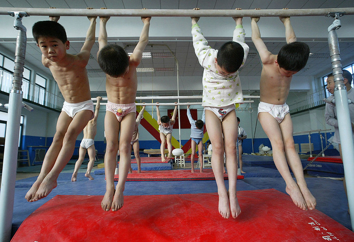 как готовят олимпийских чемпионов фото, как готовят спортсменов в Китае, Олимпиада 2021, тренировки