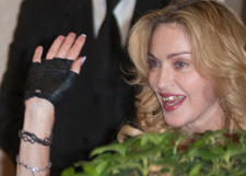 Мадонна сверкнула золотой челюстью с бриллиантами