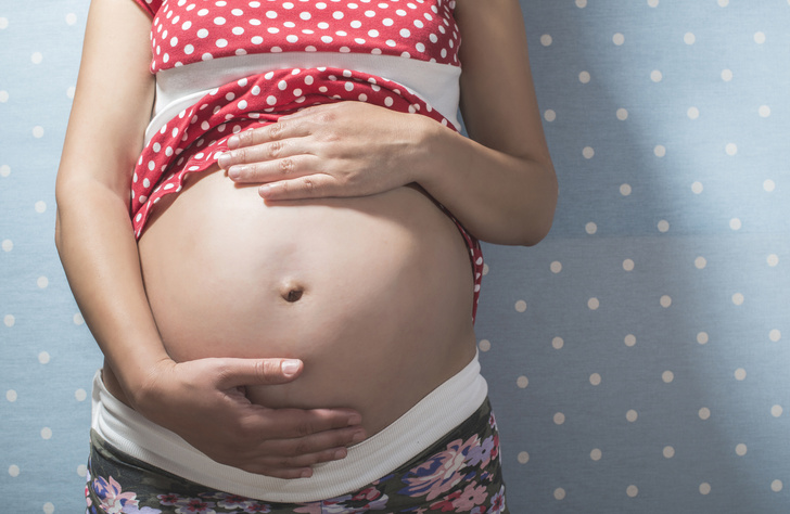 Почему у беременной болит пупок