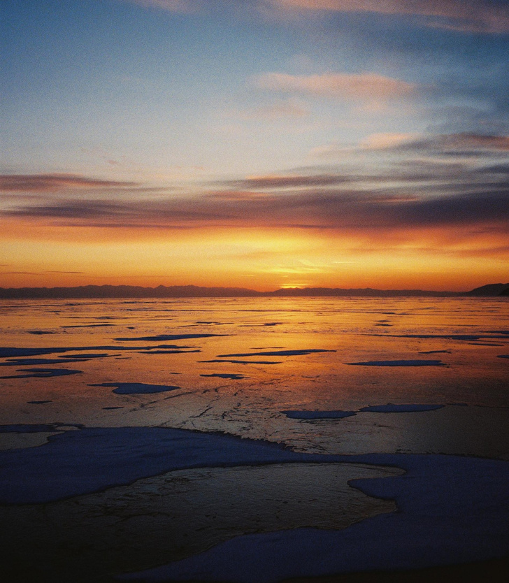 Посмотрите на великое озеро зимой, летом и осенью: байкальские времена года в 15 фотографиях