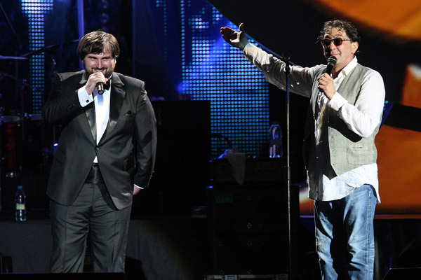 Лепс представил Шарипа Умханова широкой публике на своем концерте в «Крокус Сити Холле» 16 июля 2013 года, за полтора месяца до начала «Голоса»