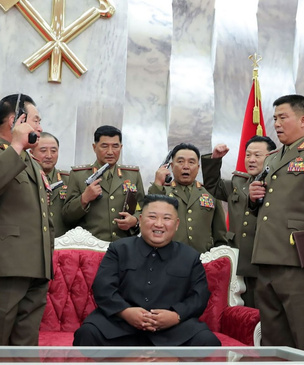 История одного фото: Ким Чен Ын и его верные пистолеты