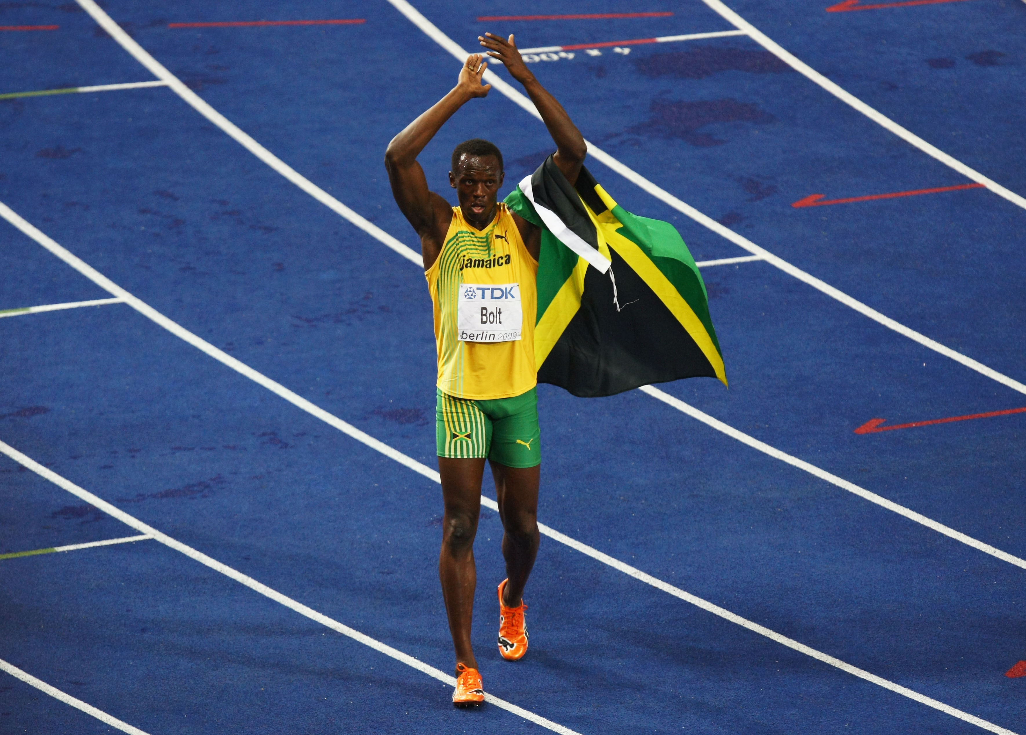Ямайский бегун рекордсмен. Усейн болт. Легкая атлетика Усэйн Усейн болт. Усейн болт жест. Усейн болт ЧМ 2009.
