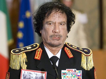 Муаммар Каддафи (Muammar Kaddafi) всеми способами пытается остаться у власти